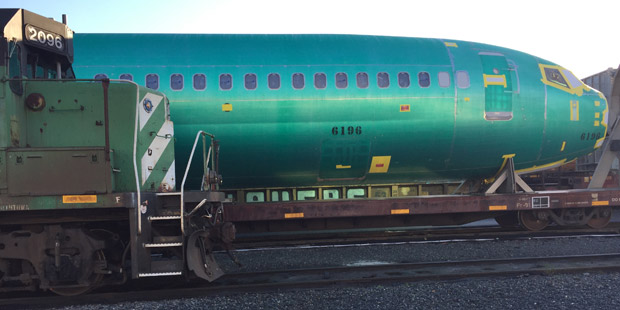 A train & a 737 jet fuselage at Interbay